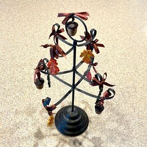 Black metal tree with acorns and fall themed leaves